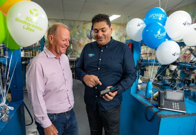 men in balloon printers office